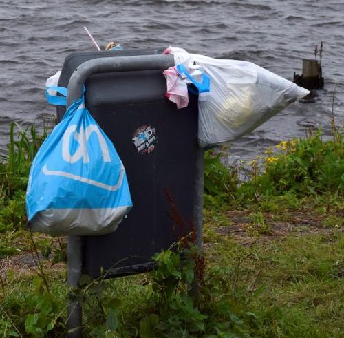 Bel Spaarnelanden bij te veel afval, 14023
